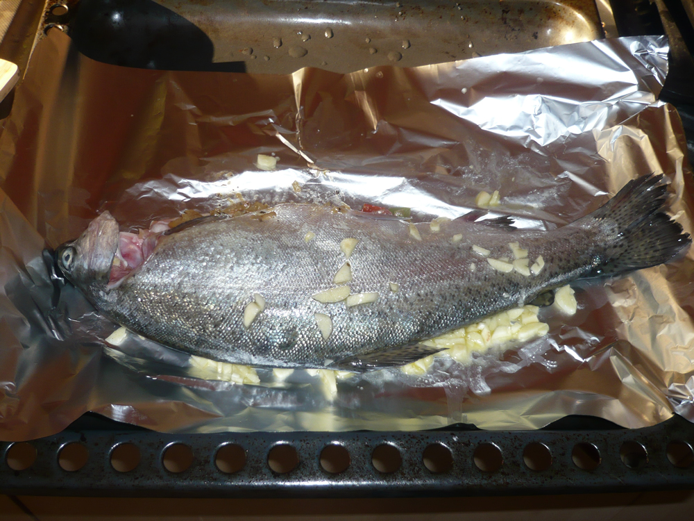 Fish - stuffed, glazed, ready to go in the oven for baking